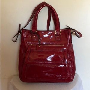 Liz Claiborne red patent leather handbag.